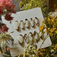 Runway-inspired press-on nails with a quiet luxury aesthetic designed for professional women, French Tips, Almond